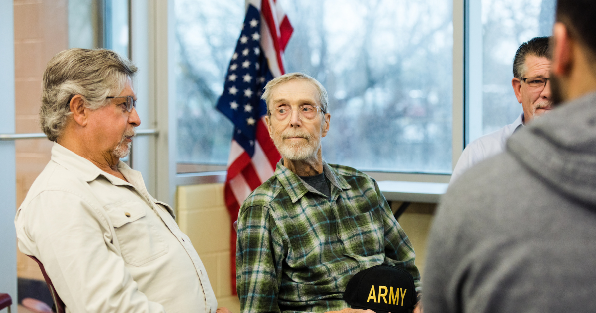 Group of senior veterans sitting